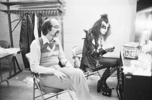 Larry Harris with Gene Simmons (photo: Fin Costello/Redferns)