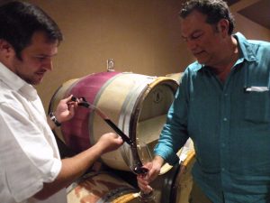 Just a sip, please: Gene Stout at the Col Solare barrel room (photo: Gretchen Sorensen)