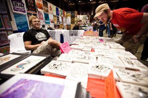 Vendor at Flatstock poster show (photo: Christopher Nelson)